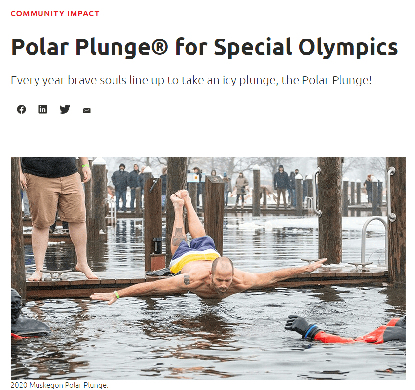 This image shows an image from a Polar Plunge for Special Olympics event of someone diving into the water.